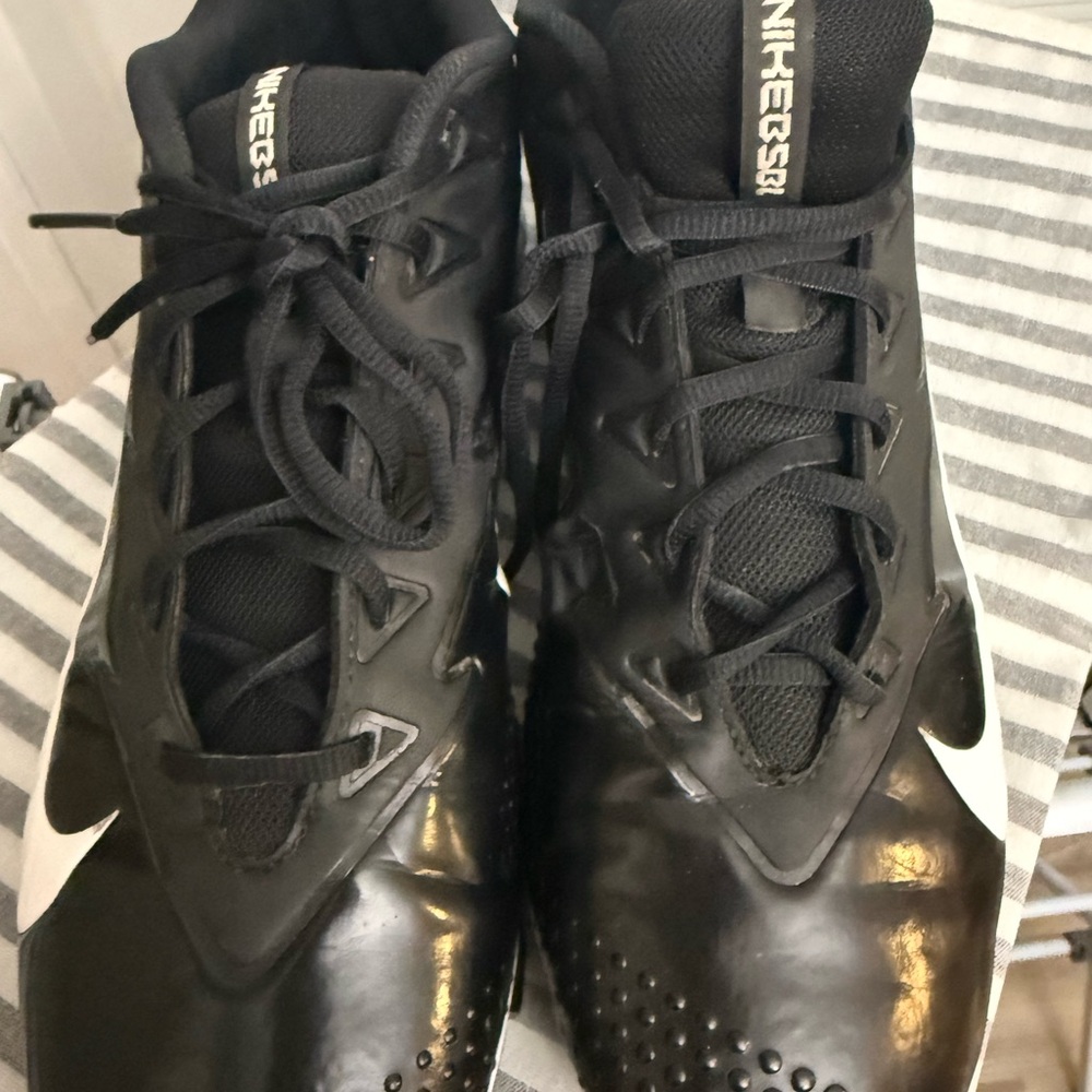 Nike Men’s Black Athletic Cleats with White Swoosh